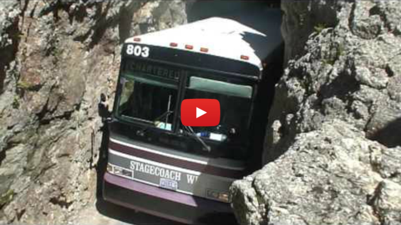 Charter Bus In Rock Tunnel